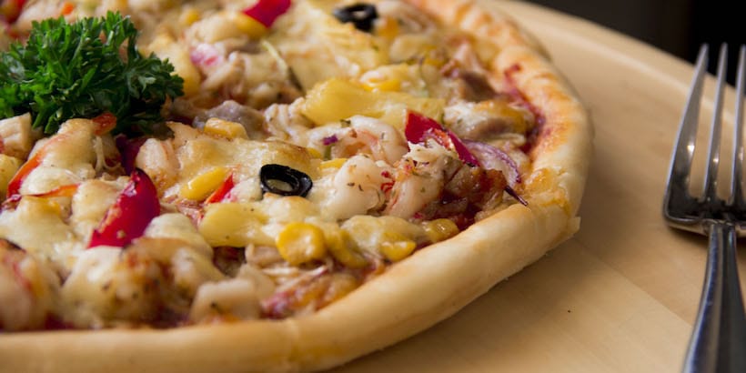 seafood pizza served at pizza park - Gatsby