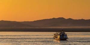 cruising-at-sunset-on-the-irrawaddy-river