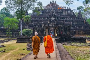 two-monks-walking-up-to-baphuon-temple